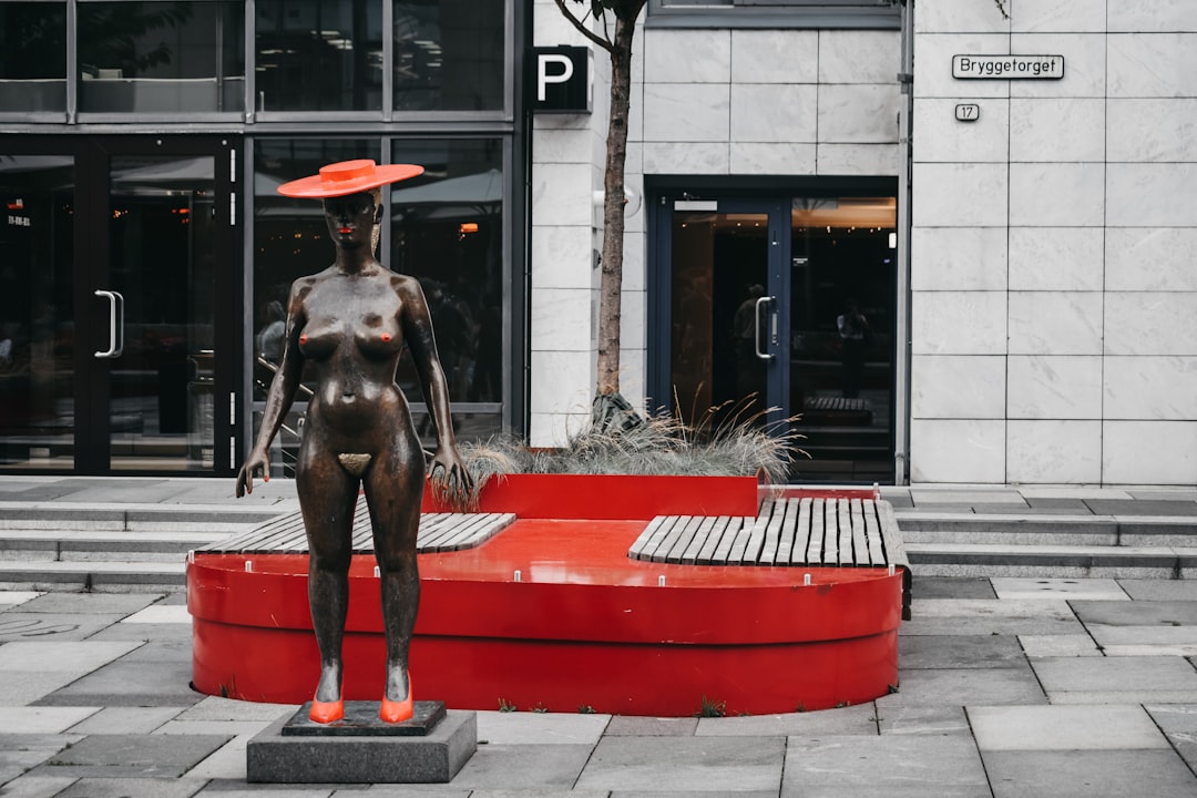 woman wearing hat statue