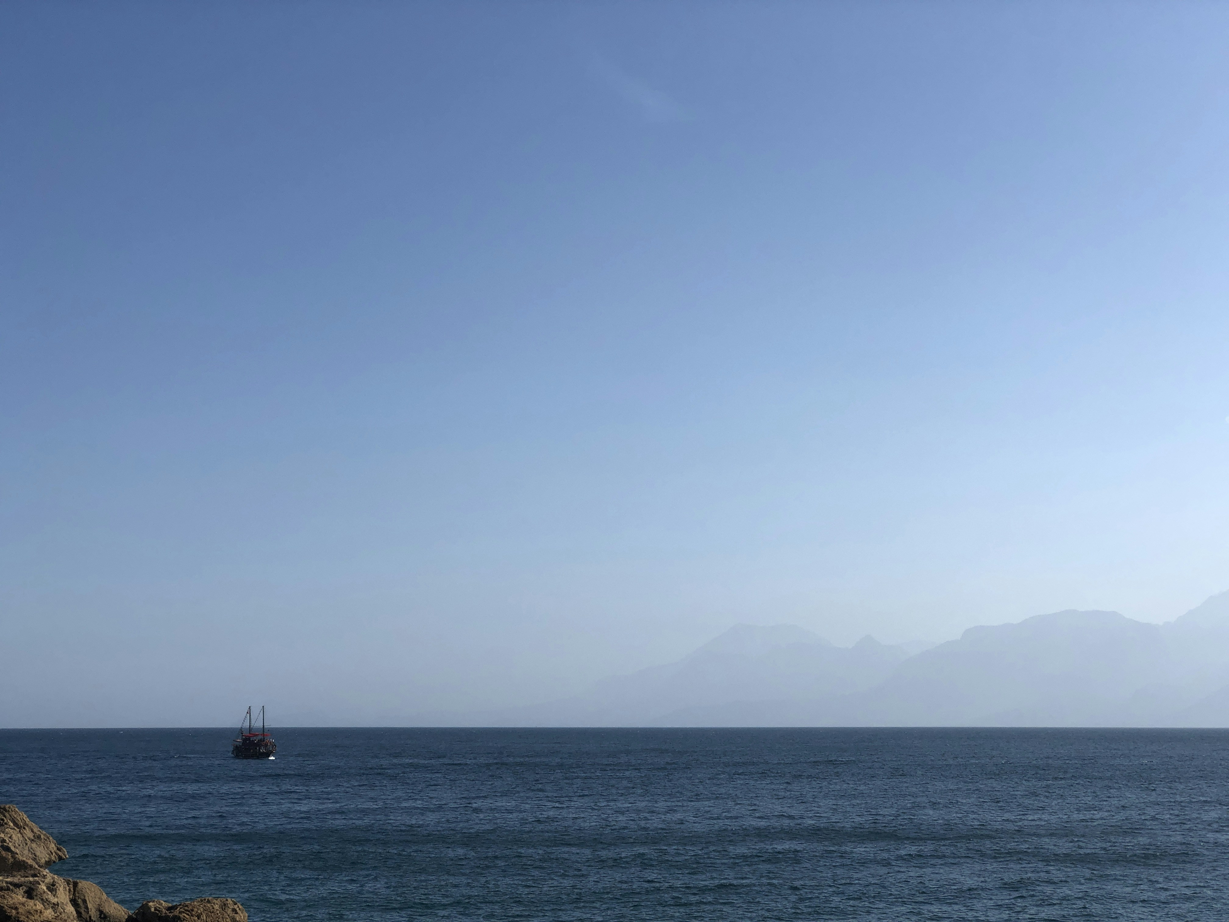 boat in ocean during daytime