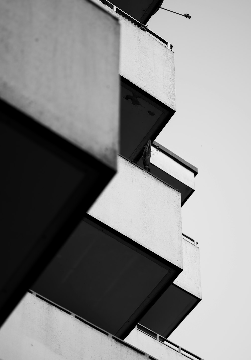 a black and white photo of a tall building