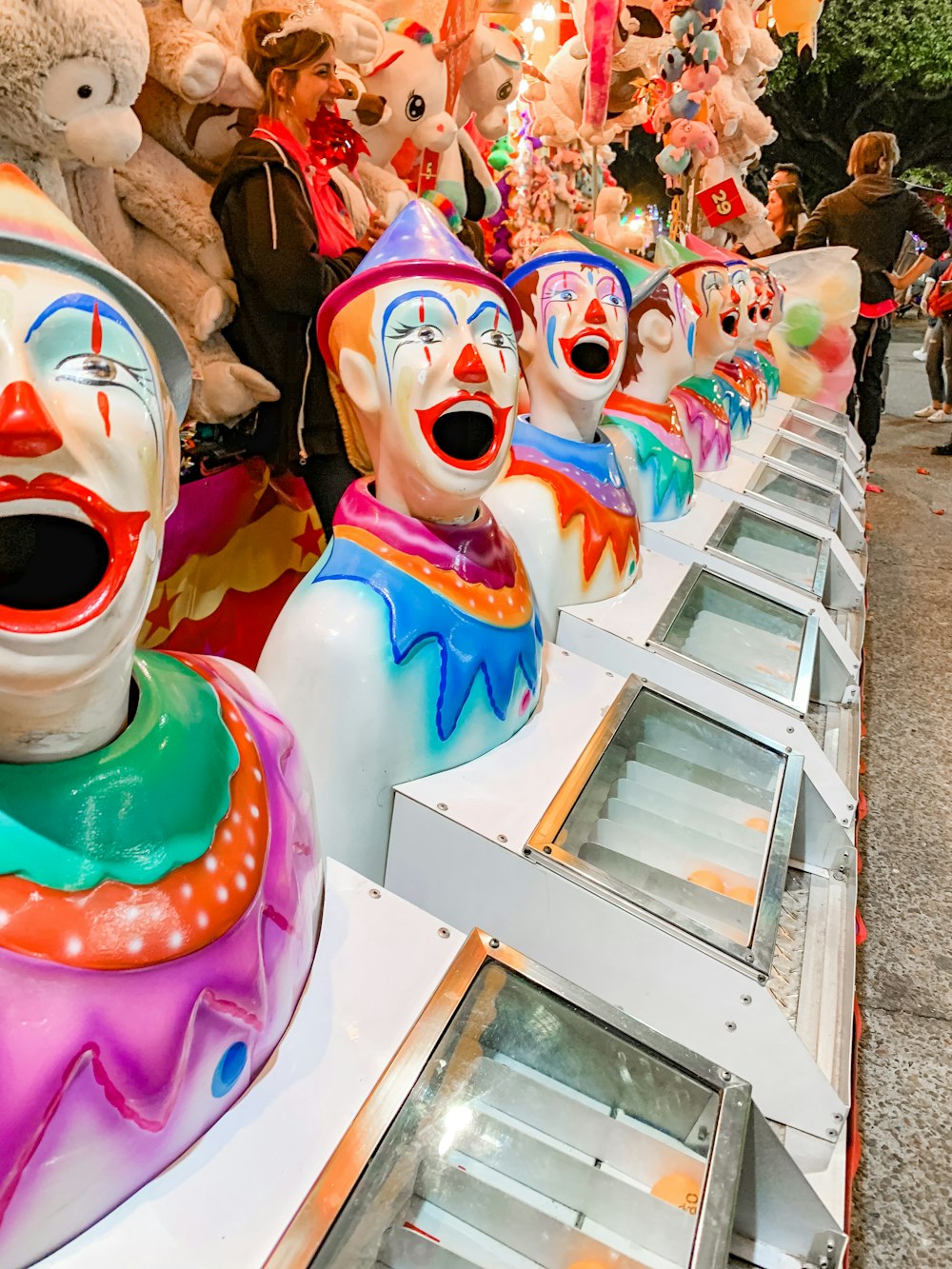 a row of clown heads sitting next to each other