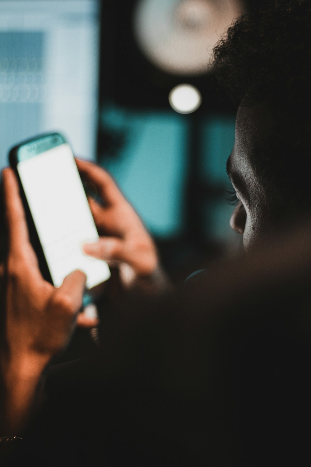 person holding black Android smartphone