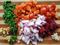 slice of vegetables on brown chopping board