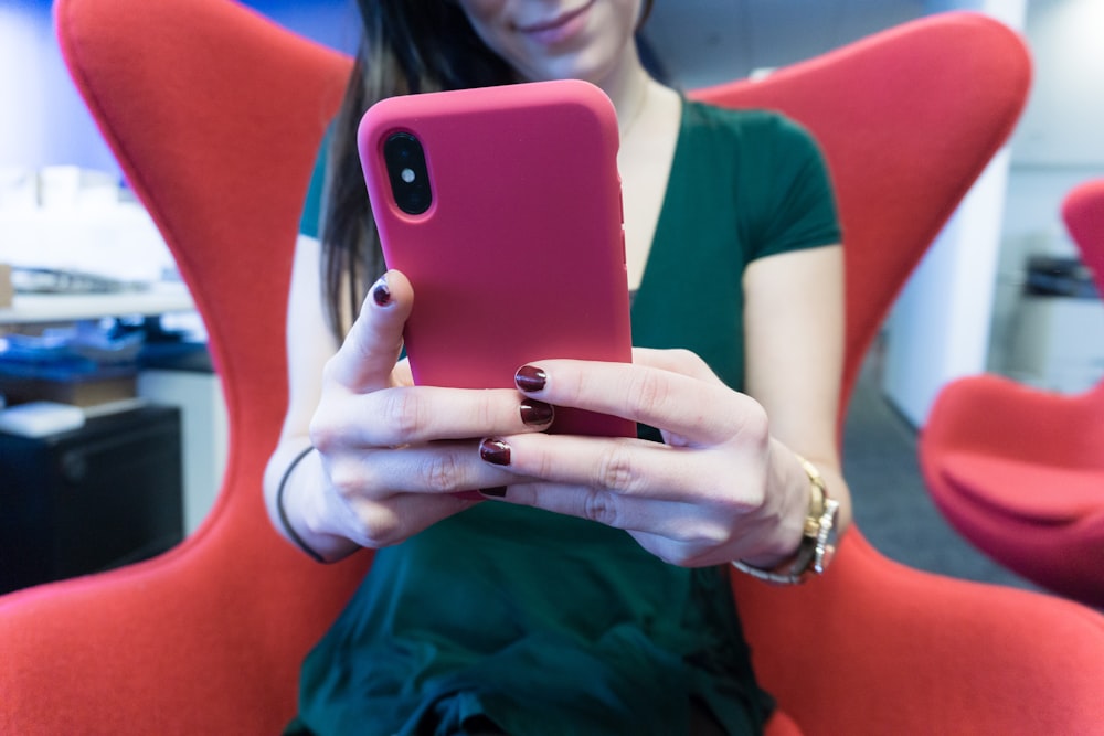 woman holding phone