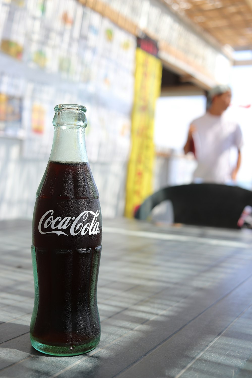 Coca-Cola bottle on table