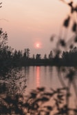 A serene image portraying a gaming environment at sunset.