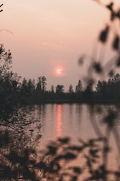 A serene outdoor scene with a gentle sunset, symbolizing peace and reflection.