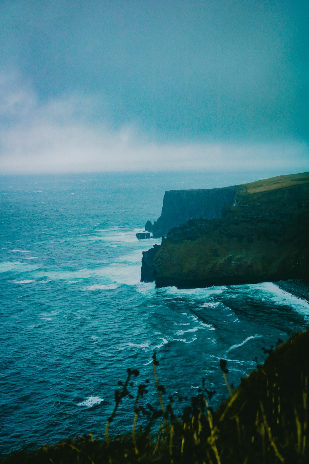 rock cliff beside ocean