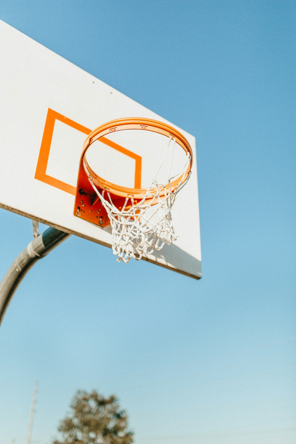 white and orange basketball system