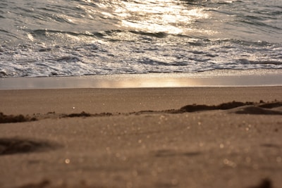 Waves gently crashing on the golden sands of Playa de Bolonia.