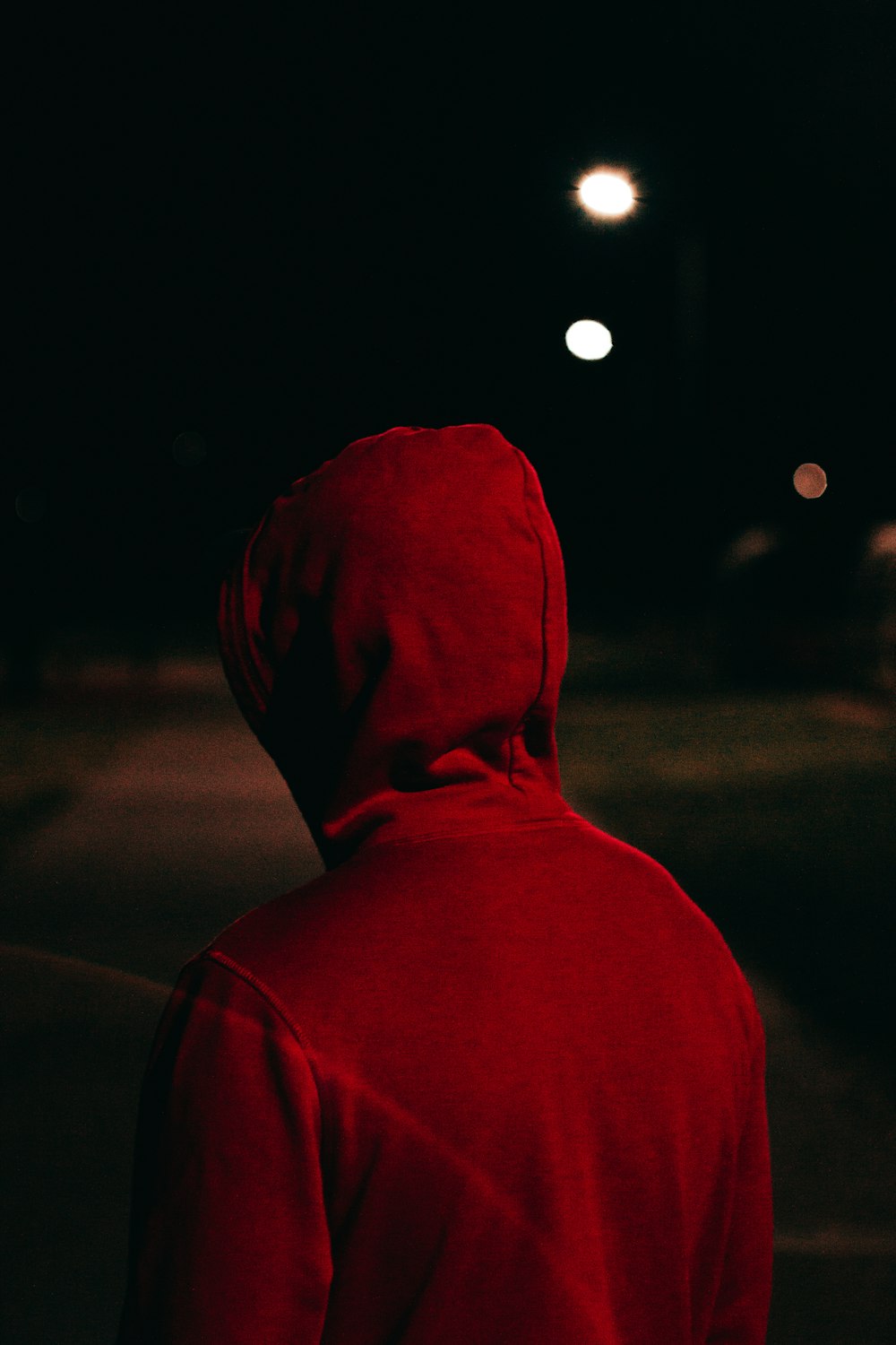 person in red hoodie