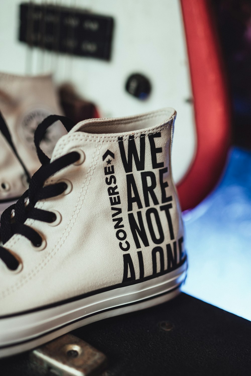 white and black Converse high-top