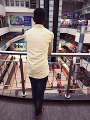 Balcony view overlooking the lush grounds and shopping mall from the luxury suite.