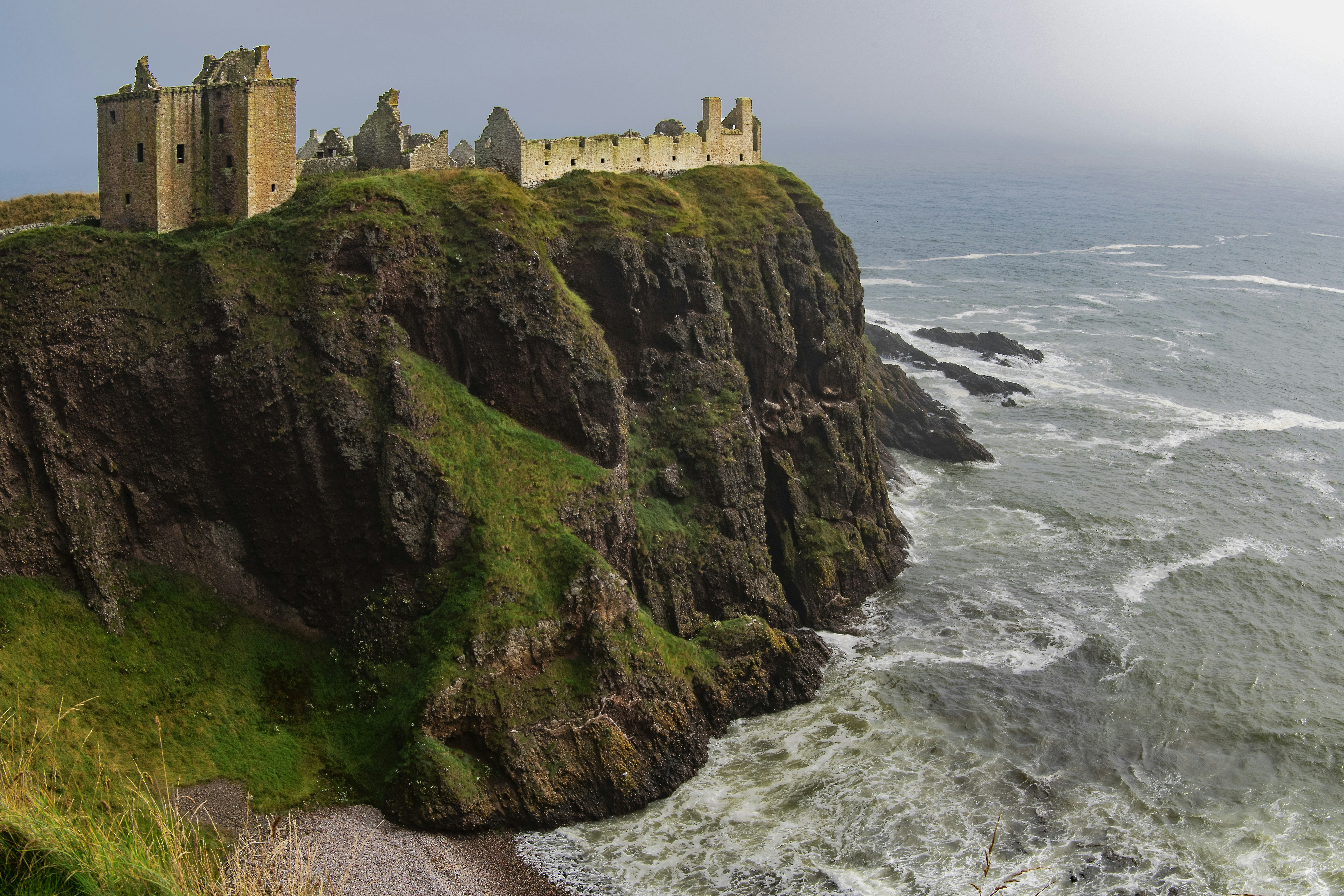 castle on hill near seashore