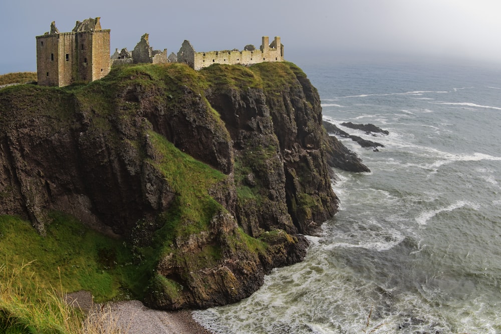 castle on hill near seashore