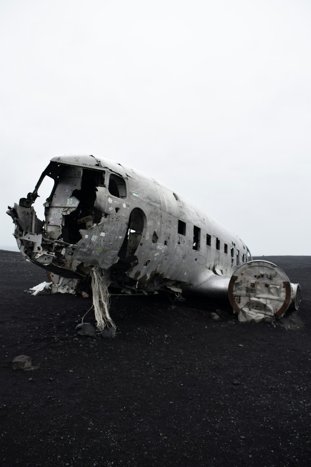 grayscale photo of wreck plane