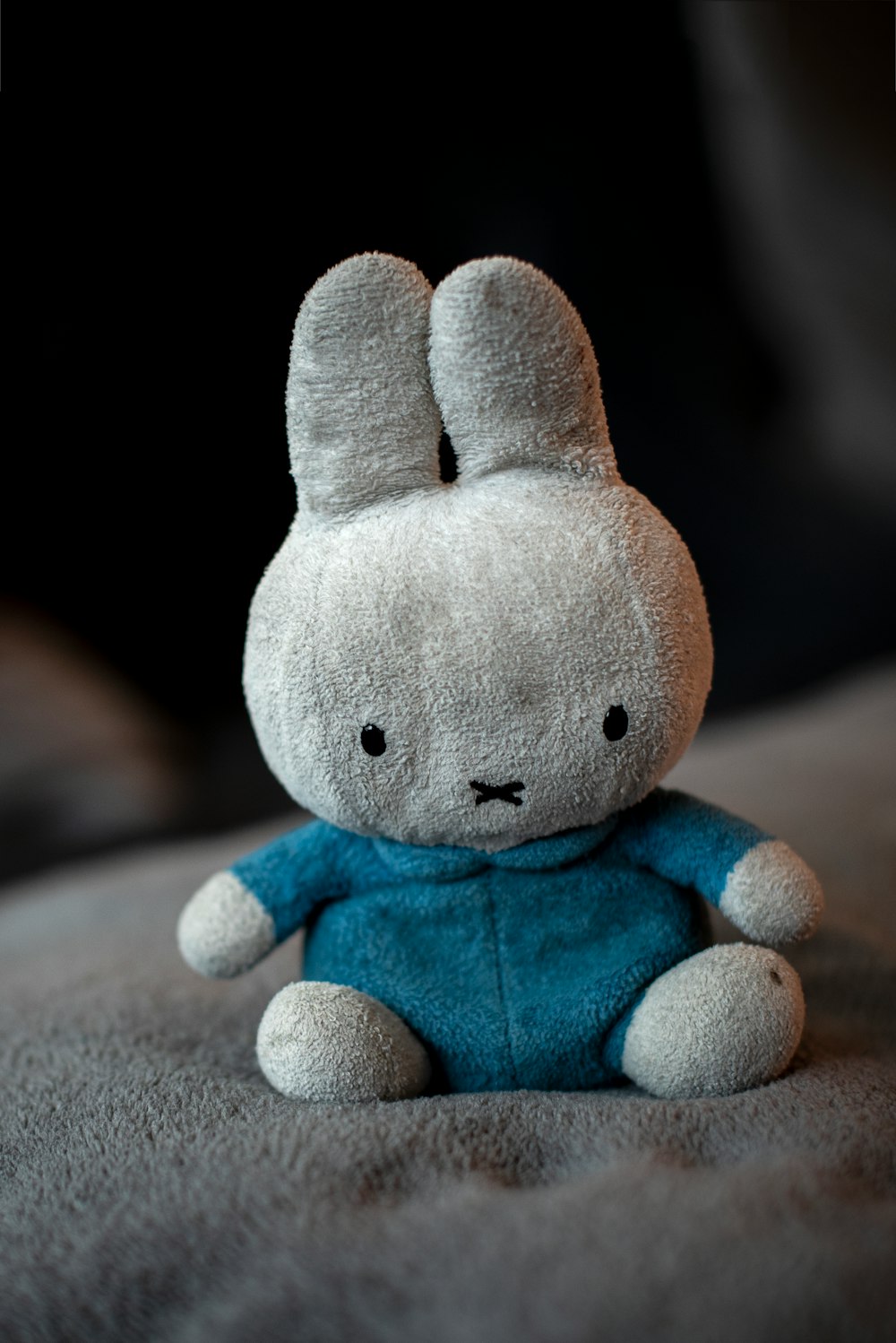 gray and blue bunny plush toy