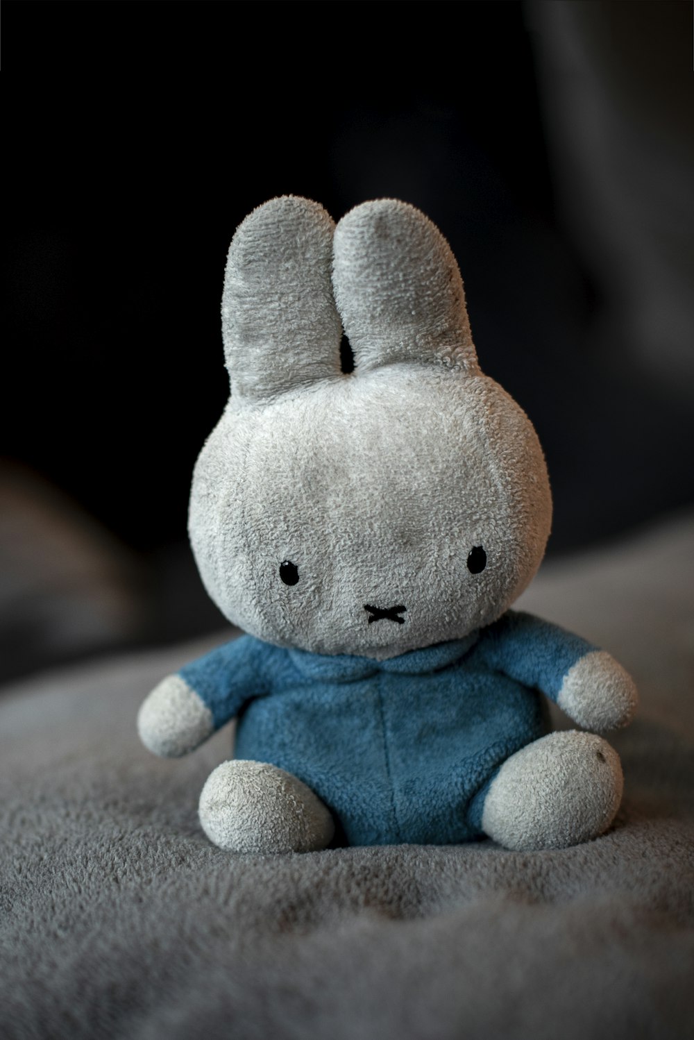 gray and blue bunny plush toy