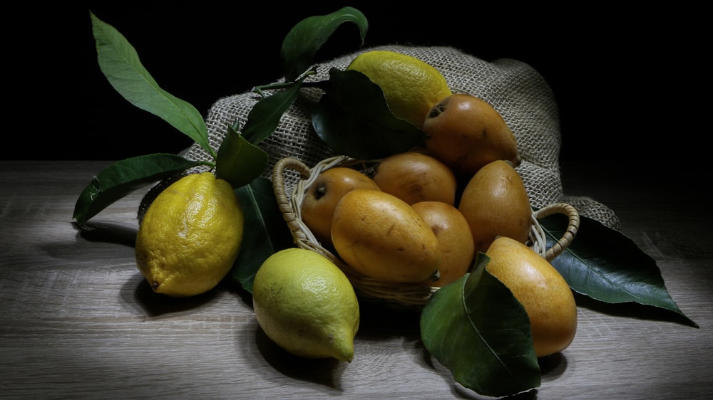 yellow fruits on brown surface