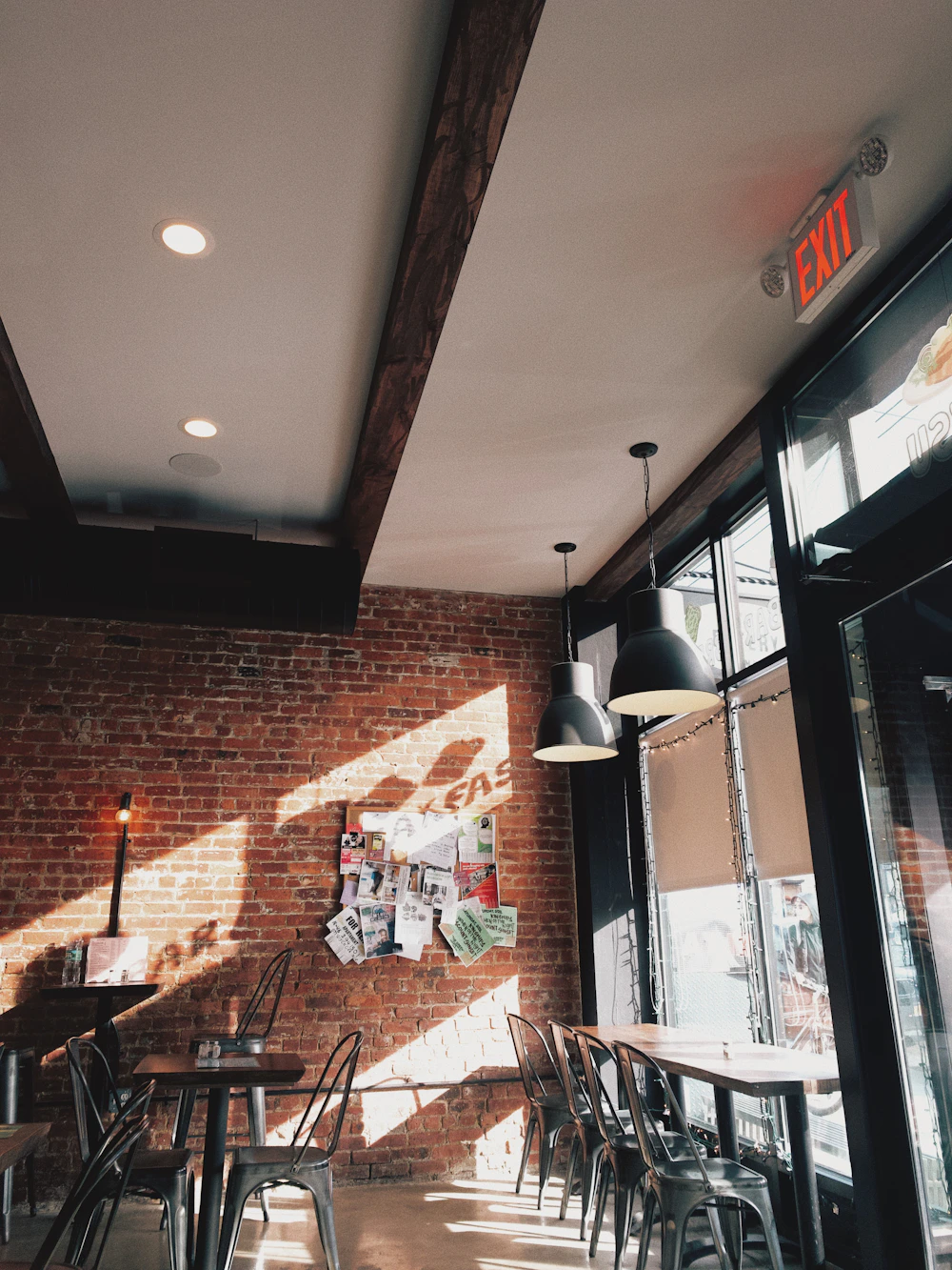 Sunlit tables inside a neighbourhood café