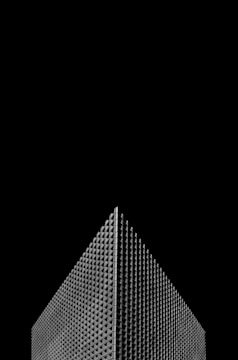 Close-up of geometric building patterns in monochrome.