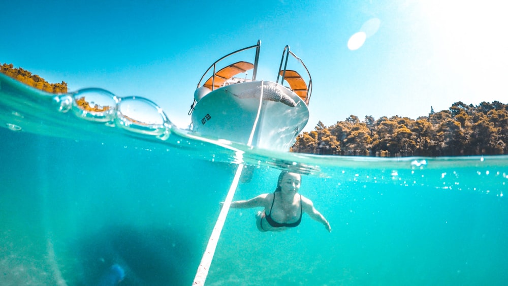 woman swimming in underwater photography