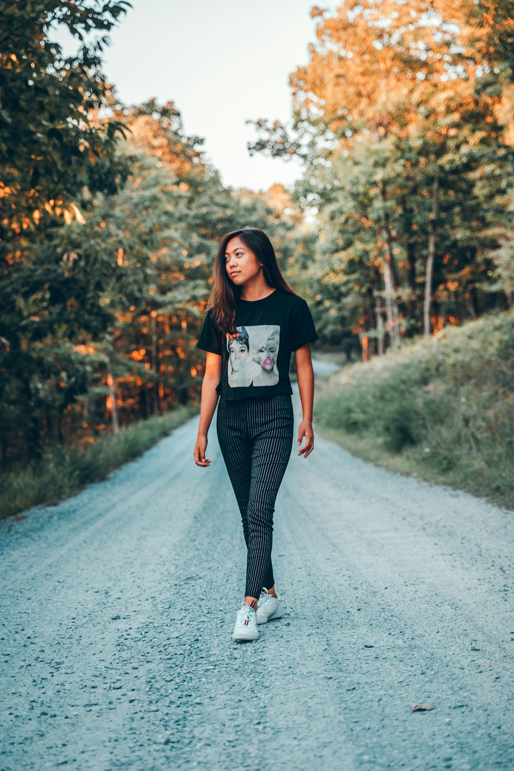 woman standing on road