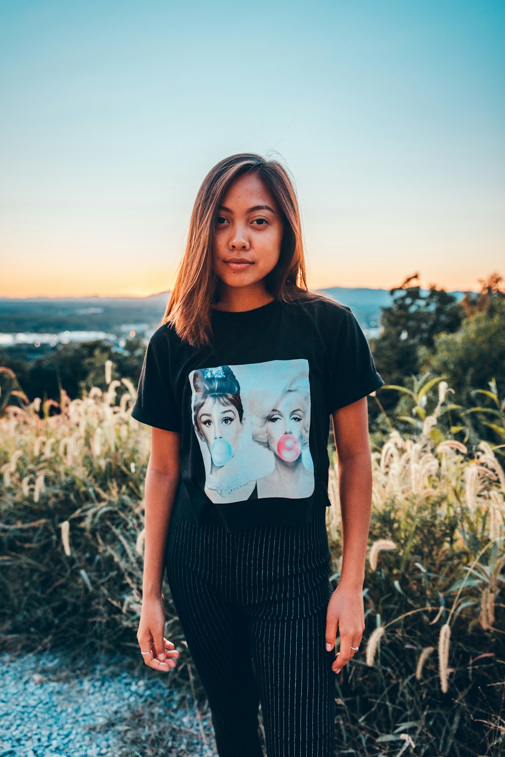 woman wearing black and white crew-neck shirt