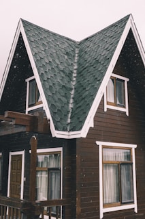 gray and brown wooden house