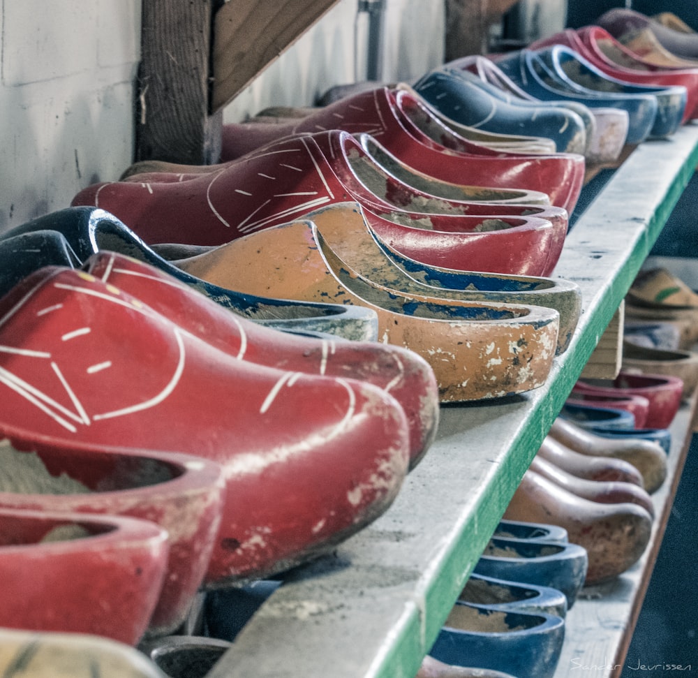 red and brown wooden shoes