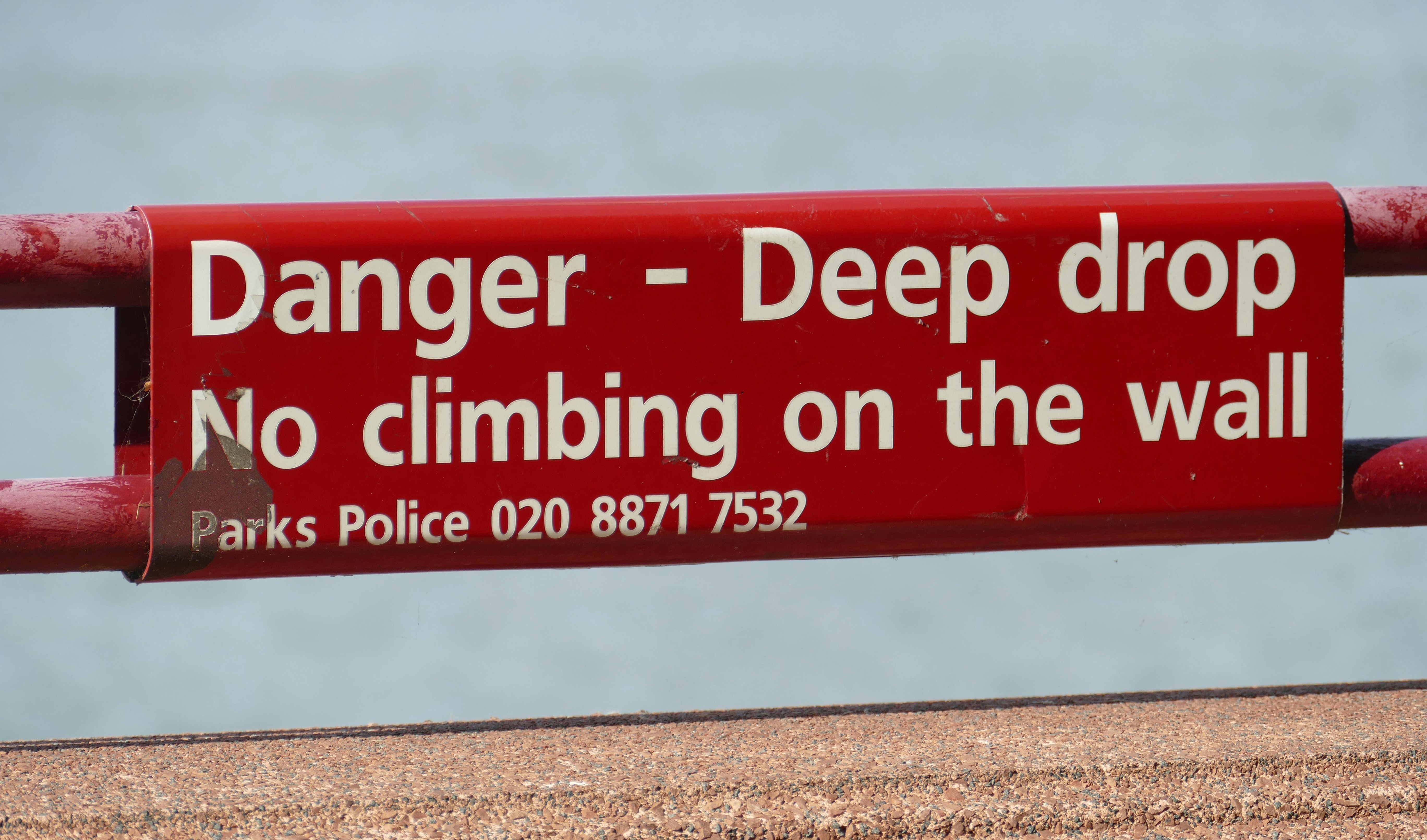red and white Danger deep drop sign