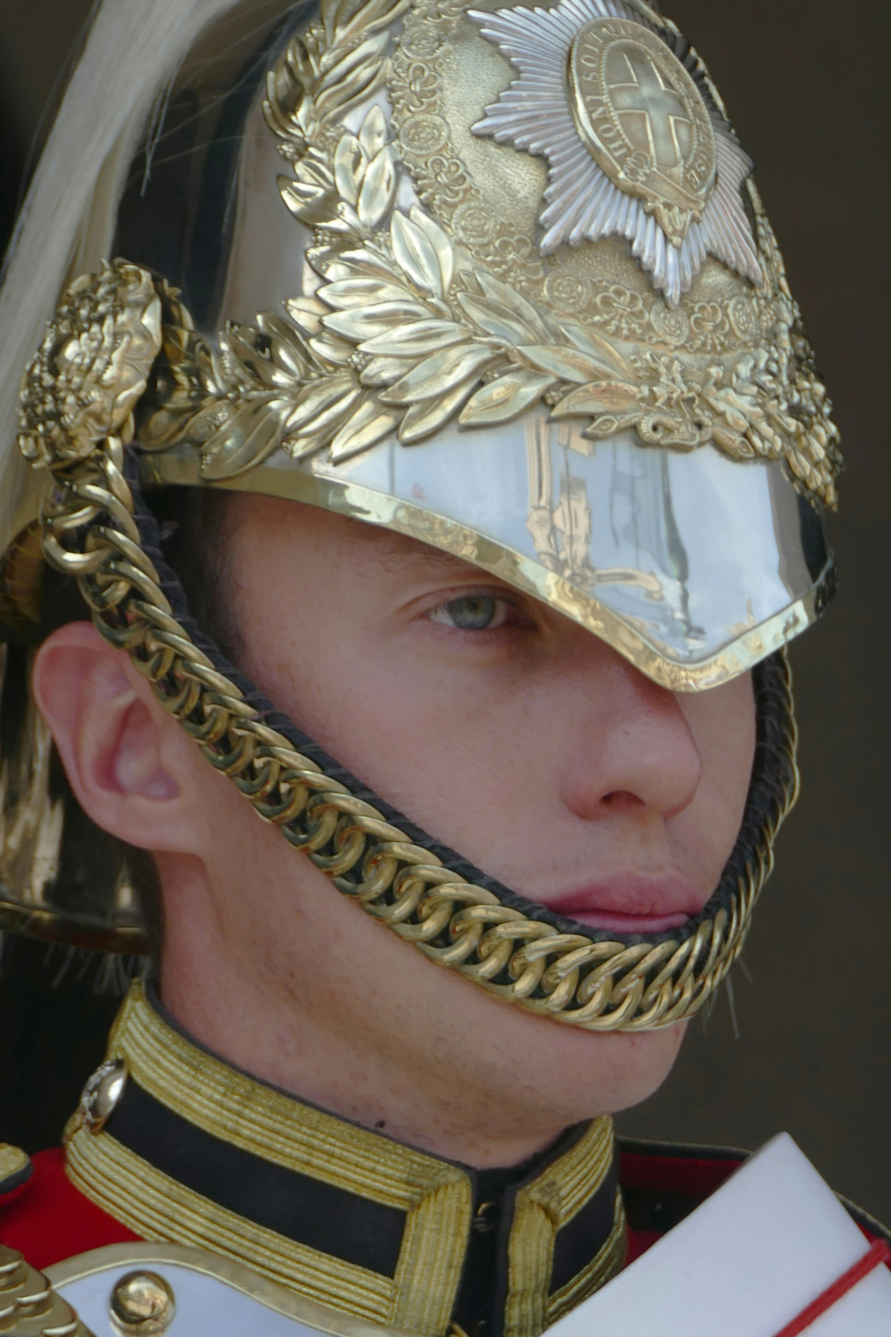 close-up photography of man wearing helmet