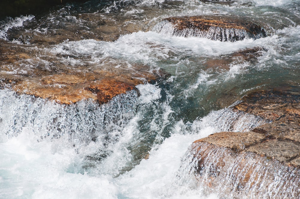 water flowing on river at daytime