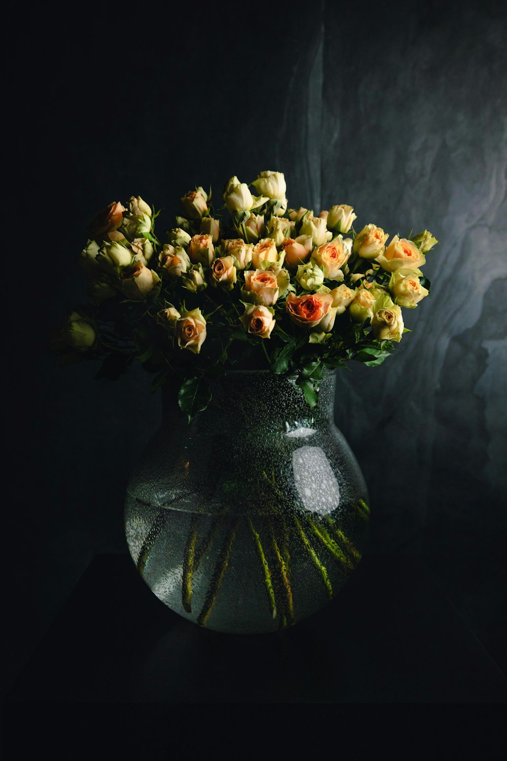 yellow flowers with vase