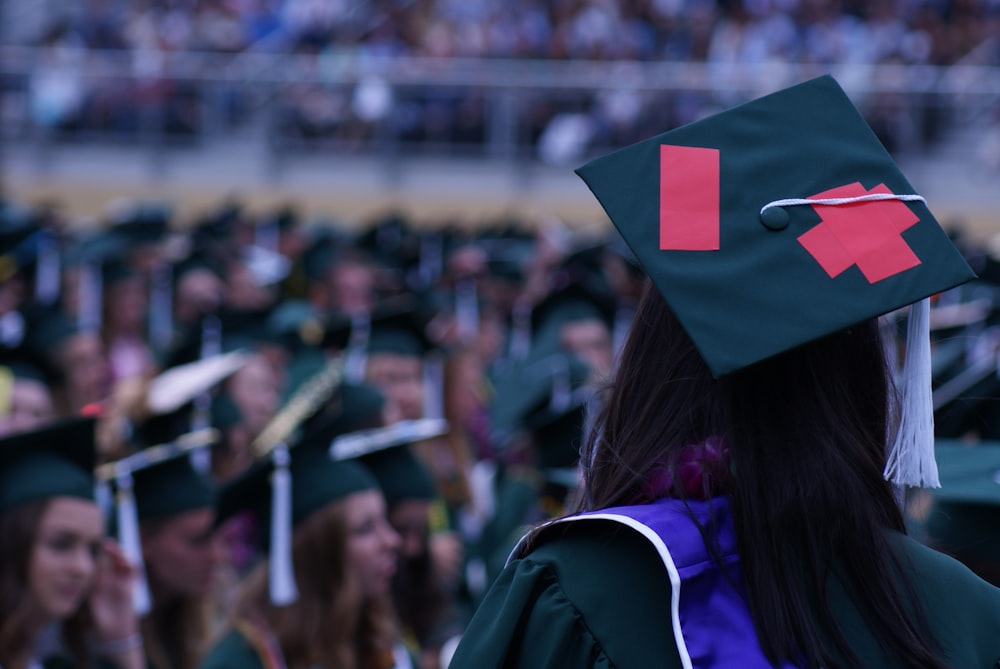 people wearing mortarboards