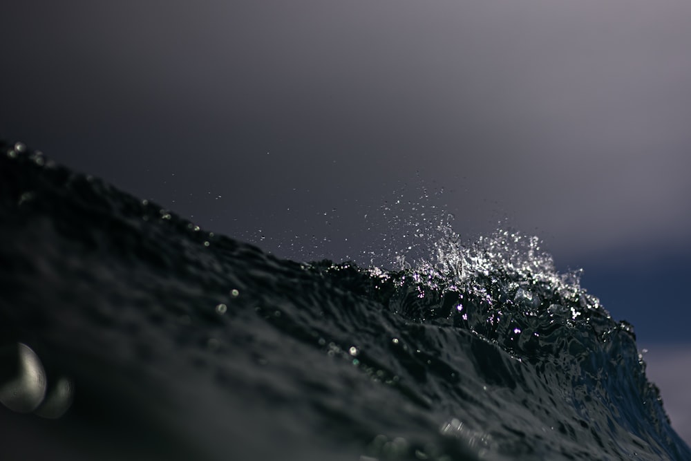 a close up of a wave in the ocean