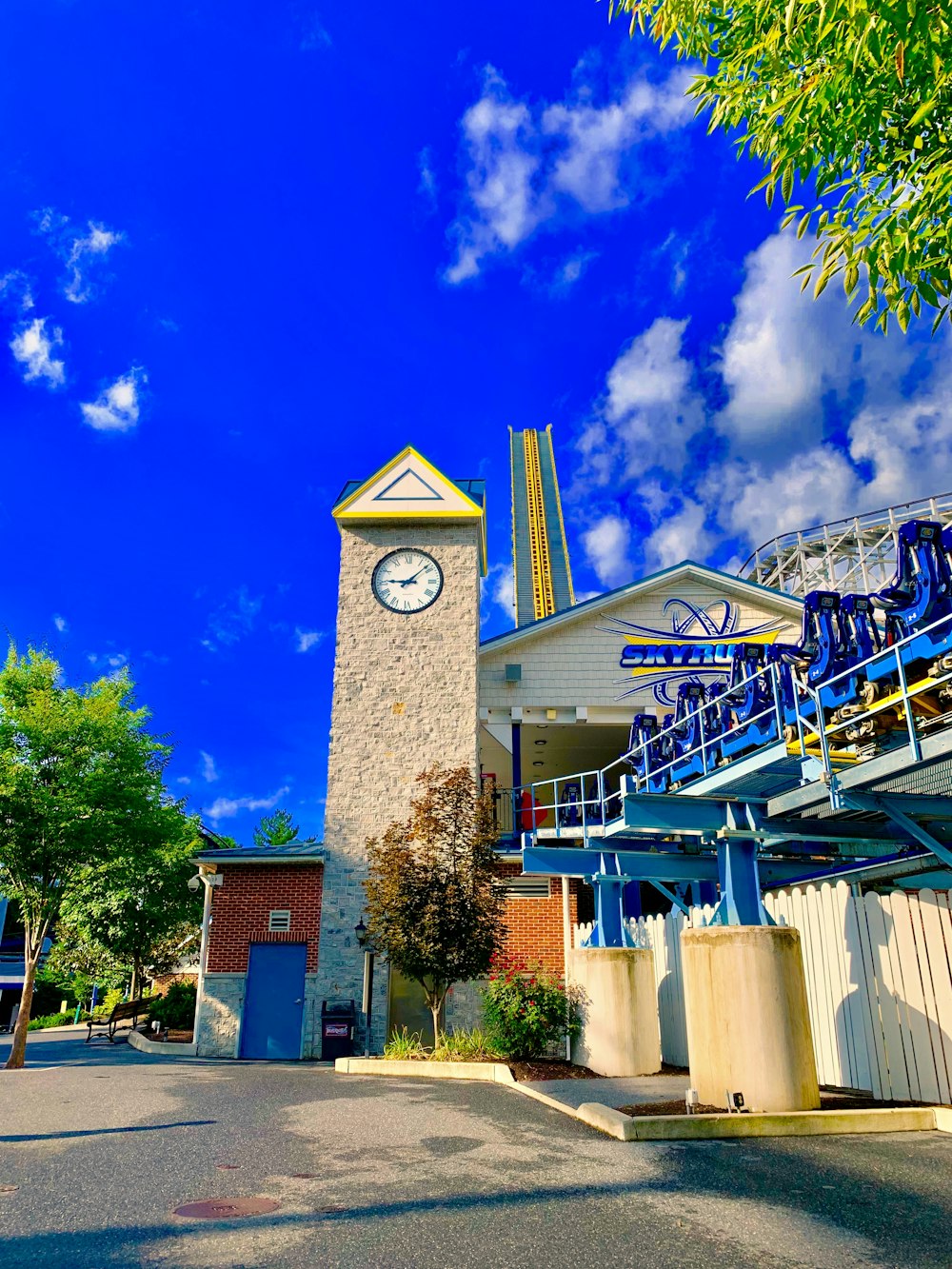 a tall clock tower sitting next to a building