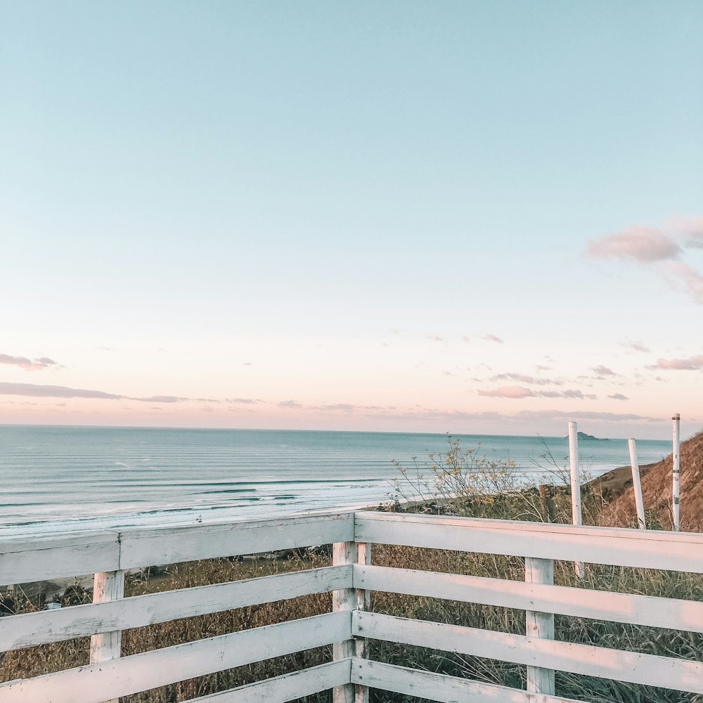 a view of the ocean from the top of a hill