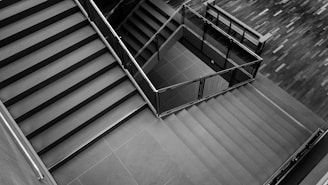 grayscale photo of stairs
