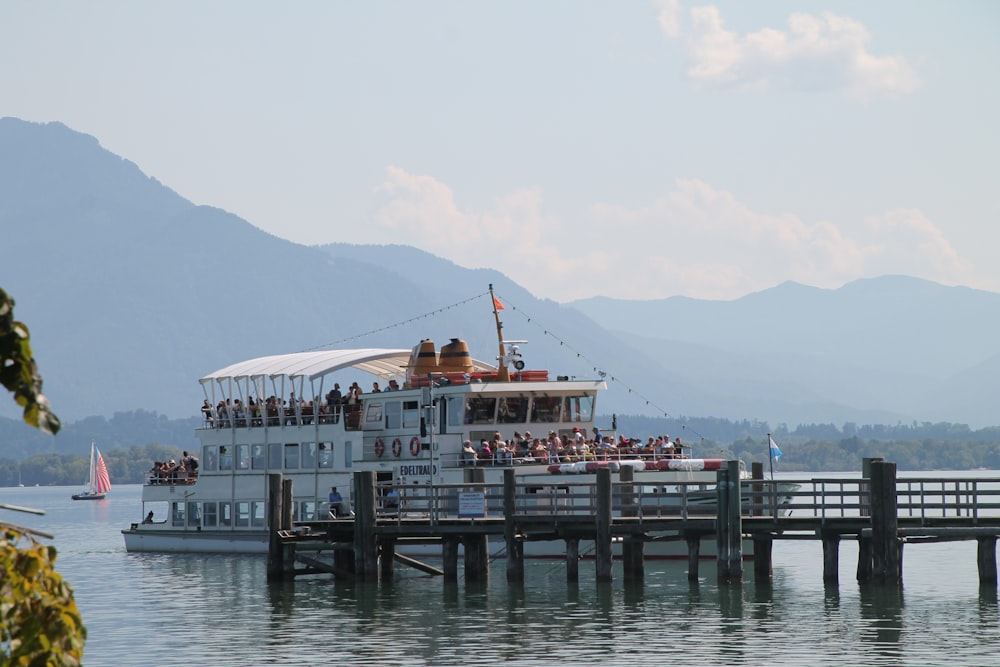 white boat near dock