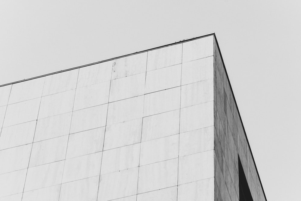 a black and white photo of a tall building