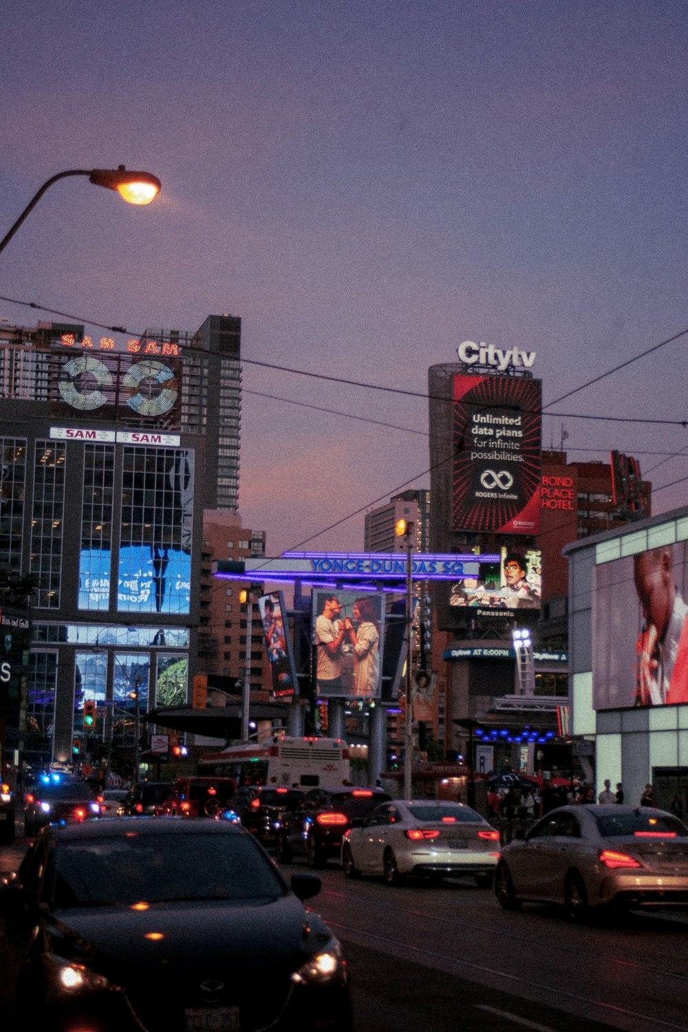 a city street filled with lots of traffic