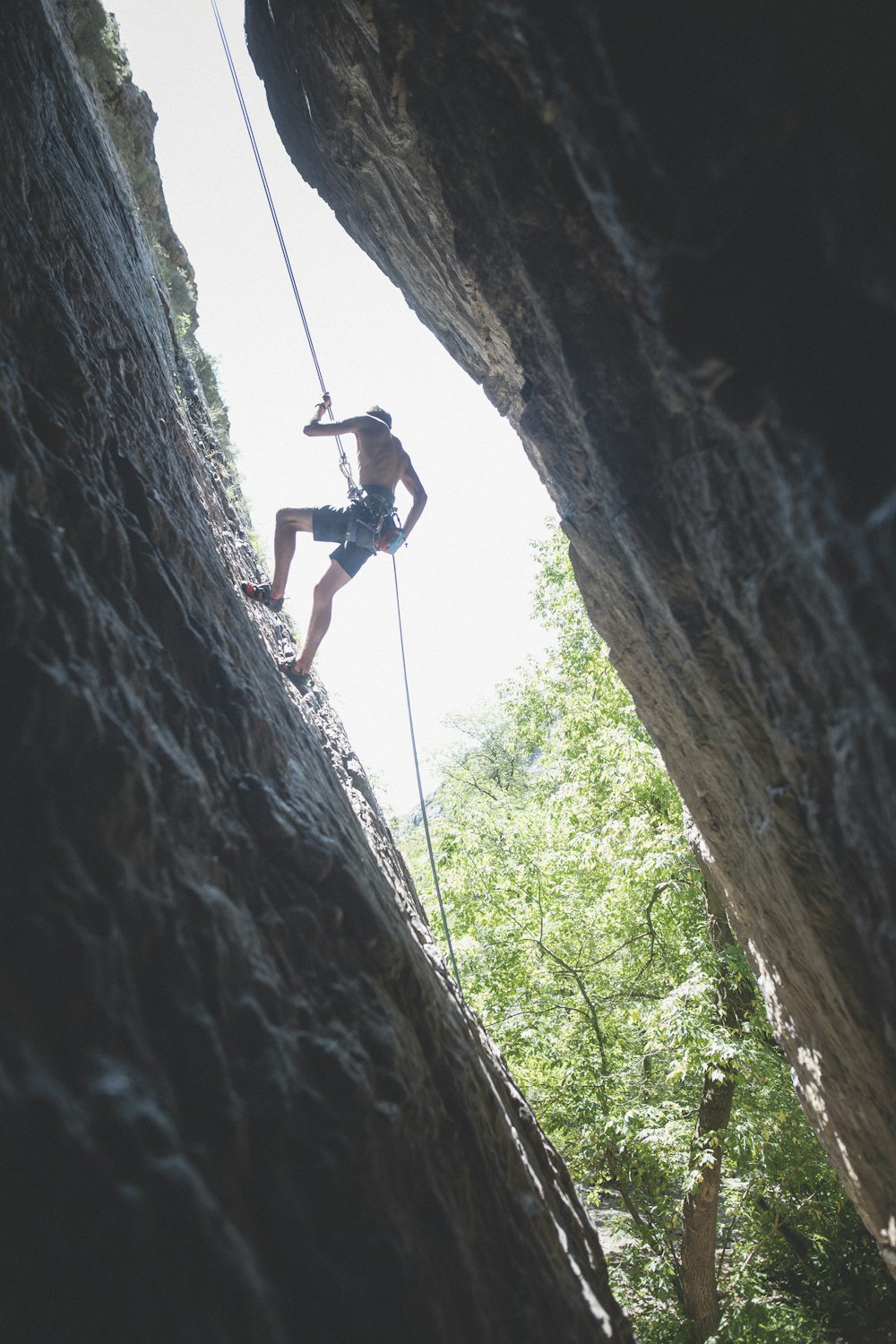 man rappelling