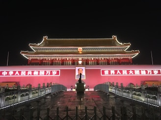 man in black jacket standing on the stage