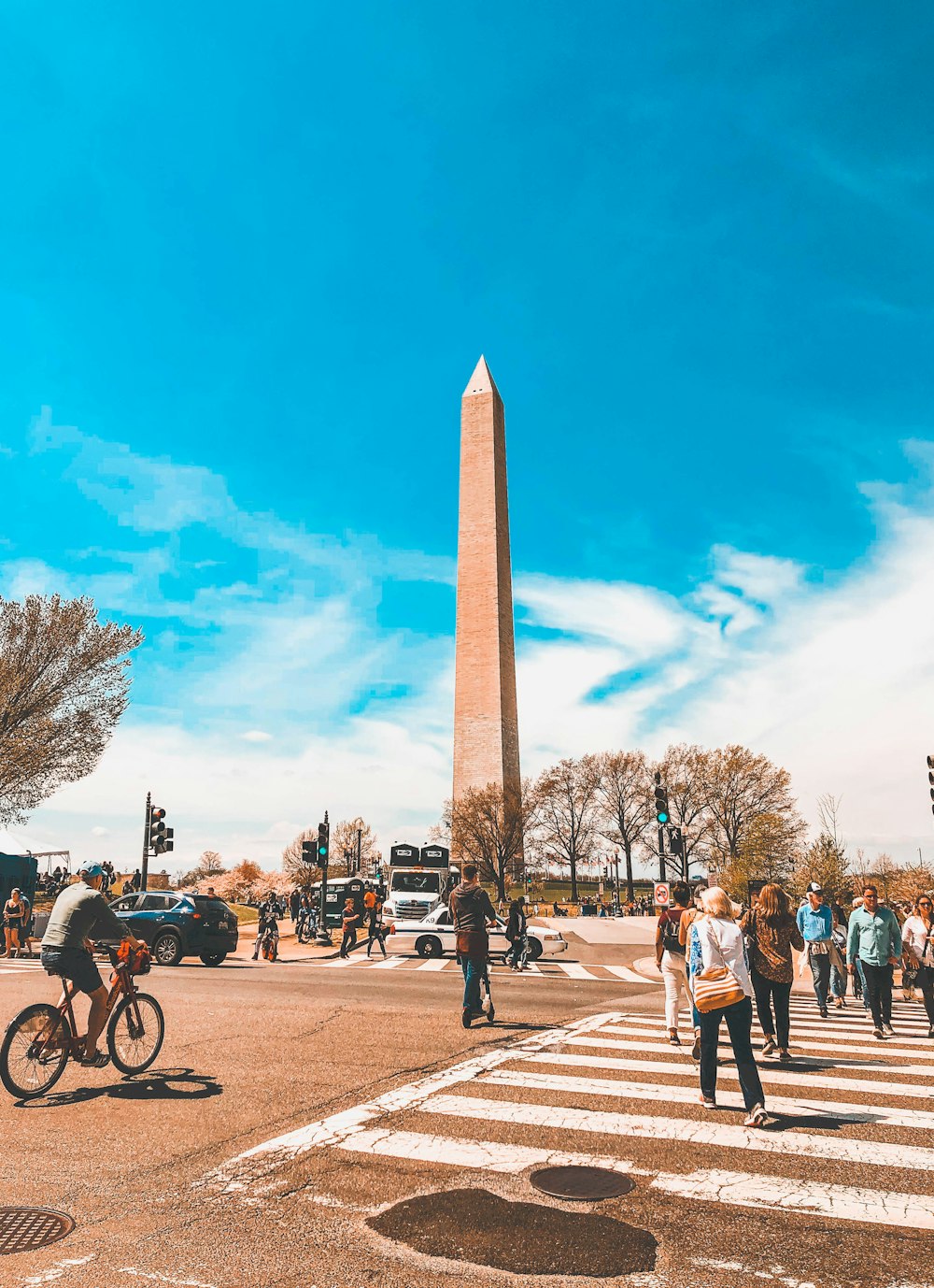 people standing across brown Obelisk