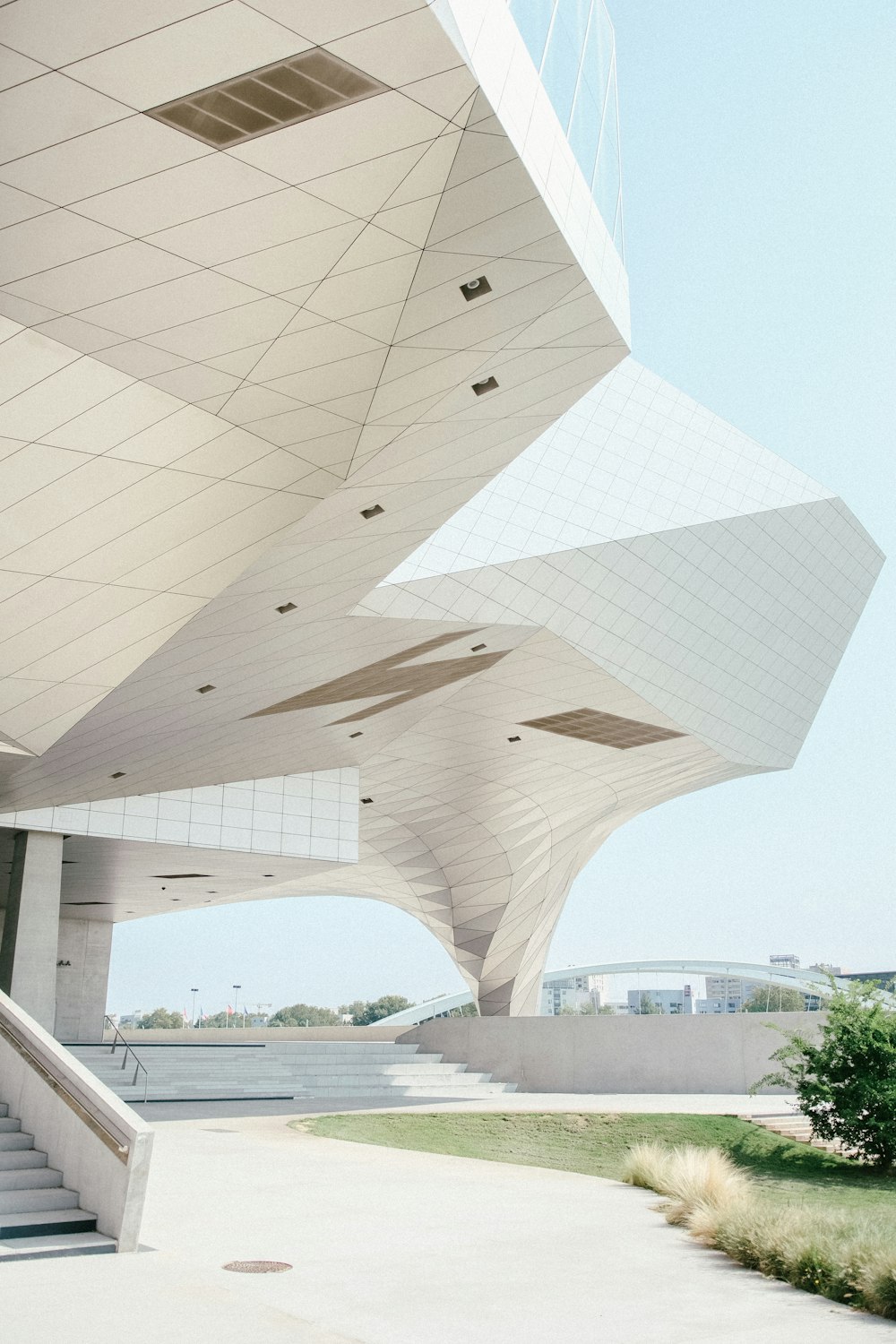 white concrete building under blue sky at daytime