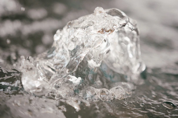 Close-up of crystal-clear water bubbling gently in a well-maintained hot tub, reflecting the calm ambiance.