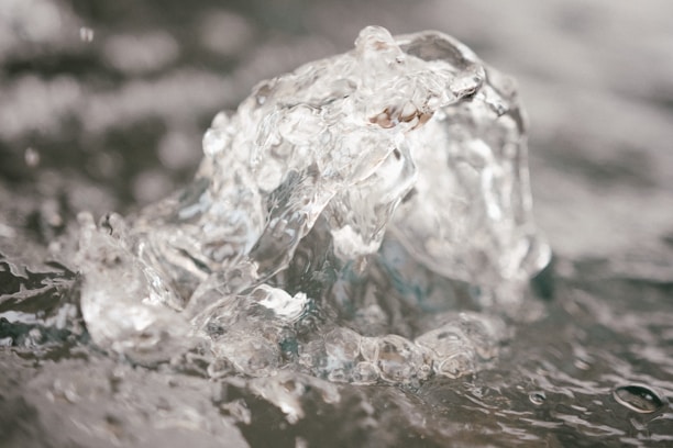Close-up of clear water flowing from an advanced water treatment system.
