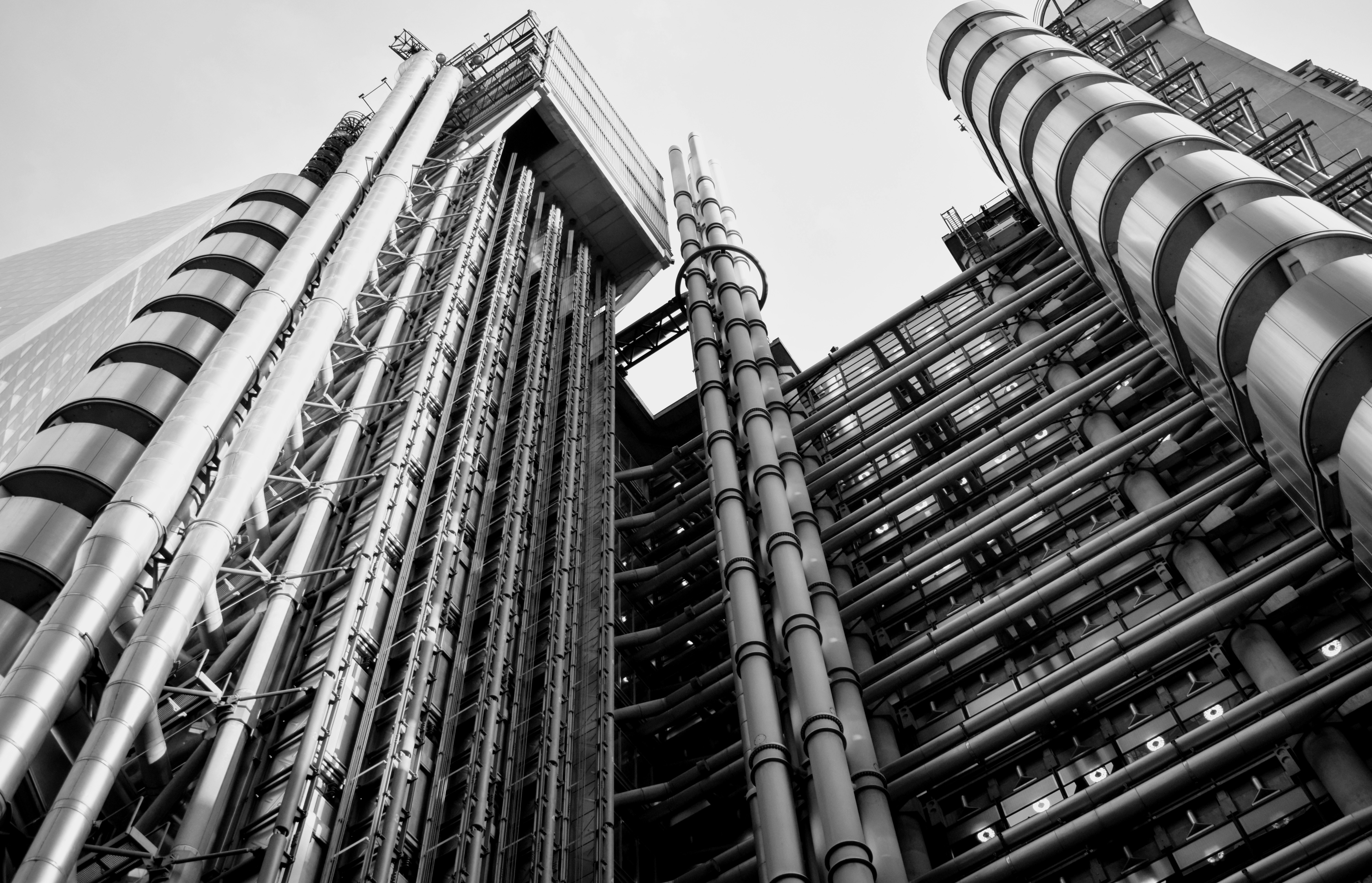 grayscale photography of high-rise building