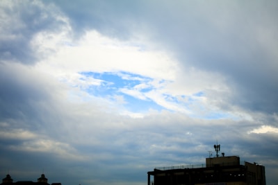 A cloud icon hovering over a cityscape symbolizing cloud connectivity.