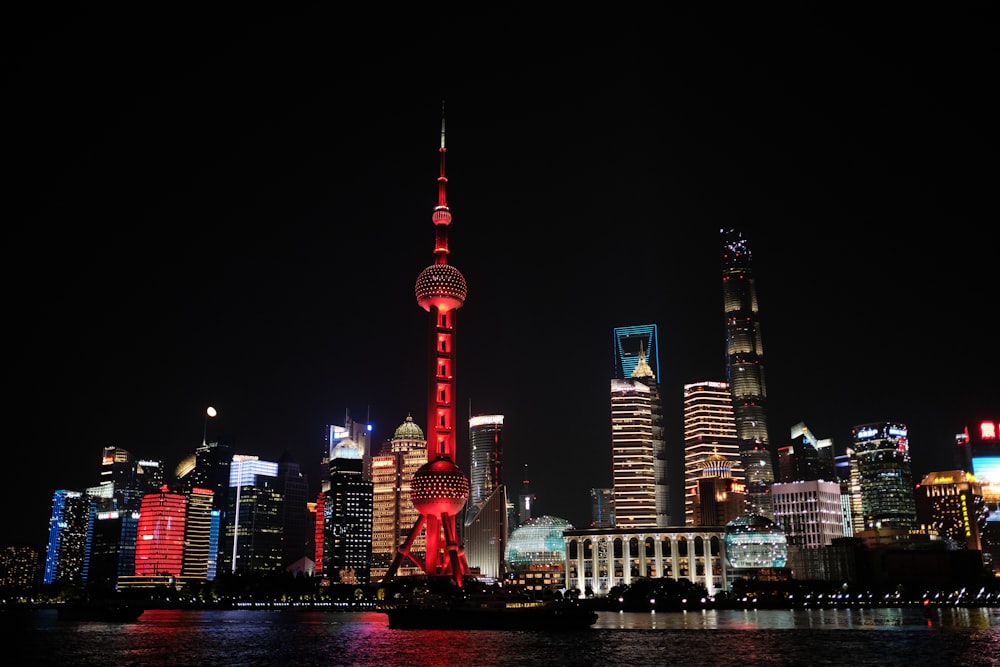 a view of a city at night from across the water